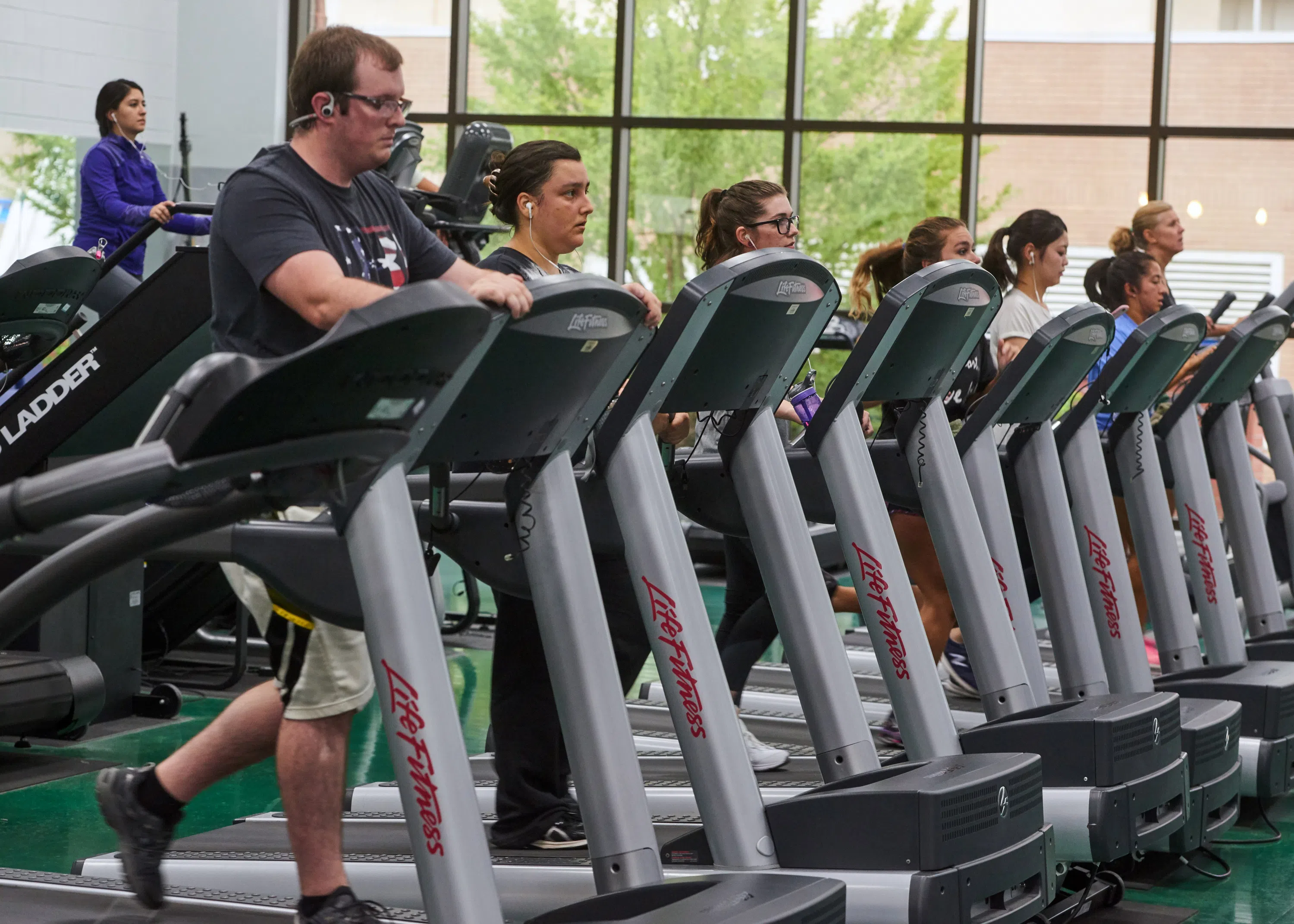 Students using treadmills.