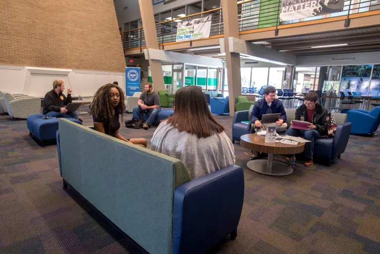 Students in the Great Hall in the commons at the University of West Florida.