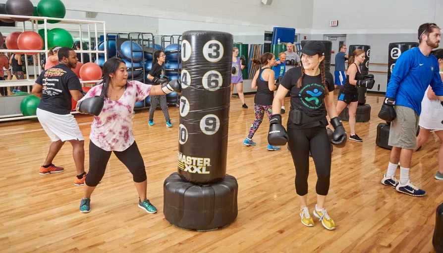 Students at a kickboxing class at the HLS facility