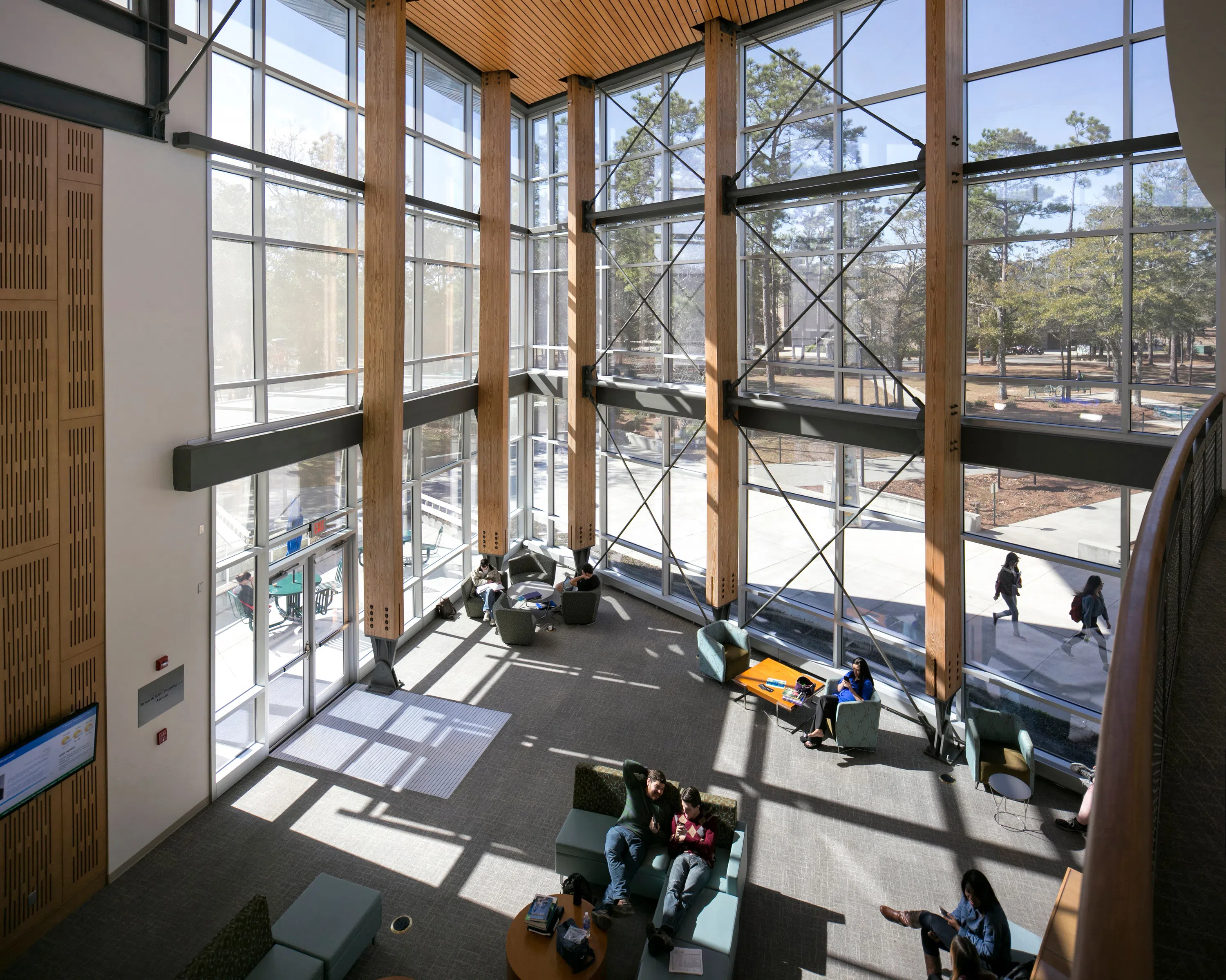 A upper floor view looking down on the atrium in the College of Business. 