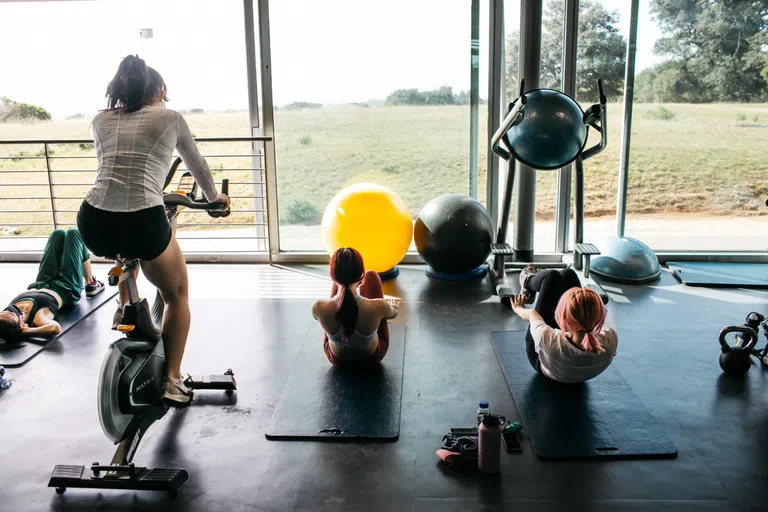 Students exercise in the rec center