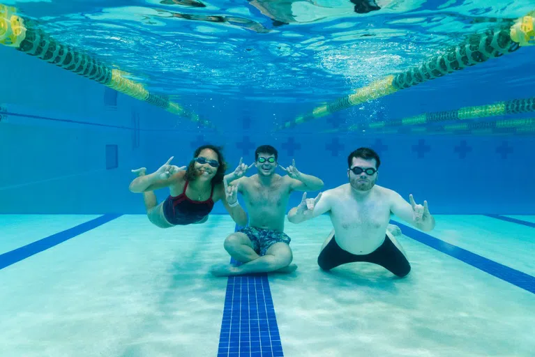 Students using the USF pool