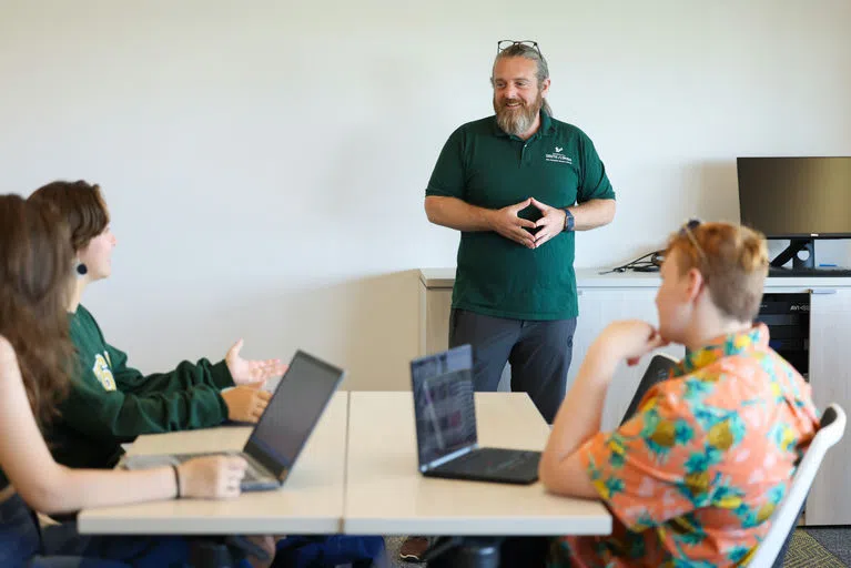 Faculty teaching a class in the Judy Genshaft Honors College.