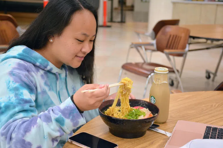 Maile Shinshiro enjoys a bowl of ramen