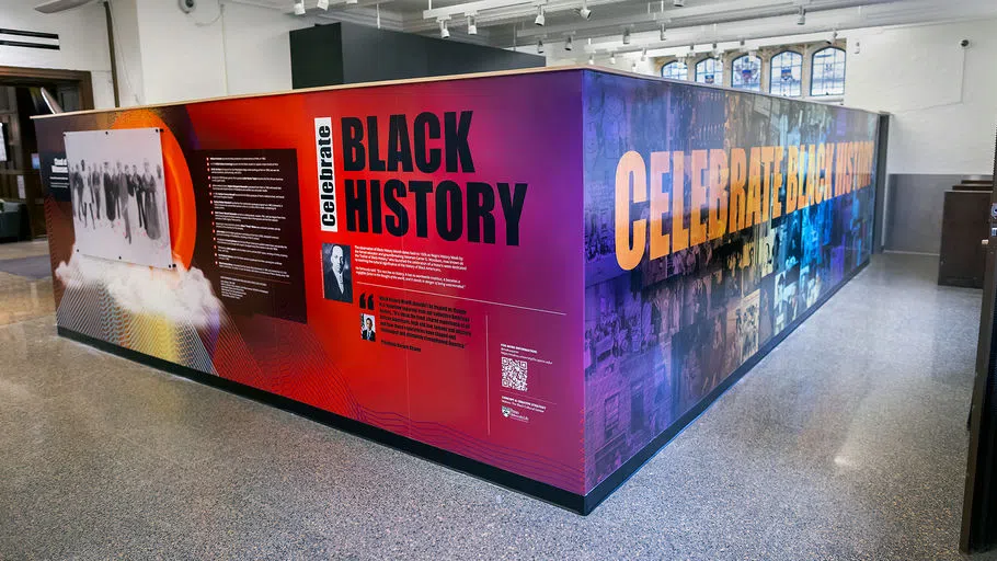 Large, room-sized rectangular block with the text "Celebrate Black History". There are images and timelines on each wall of the block.