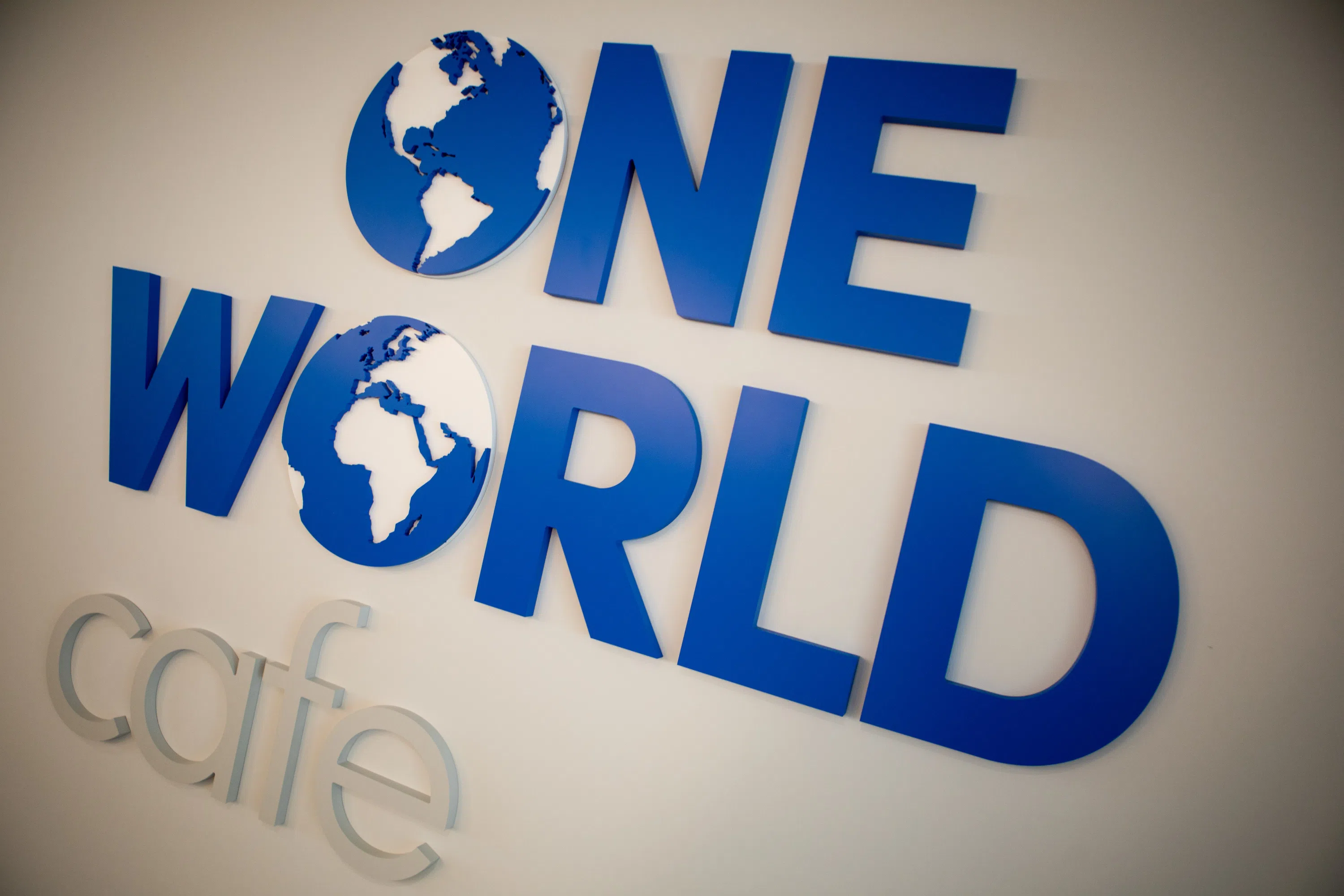 One World Café Sign