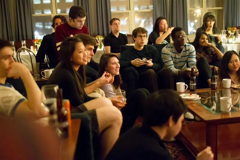 students gather in a room