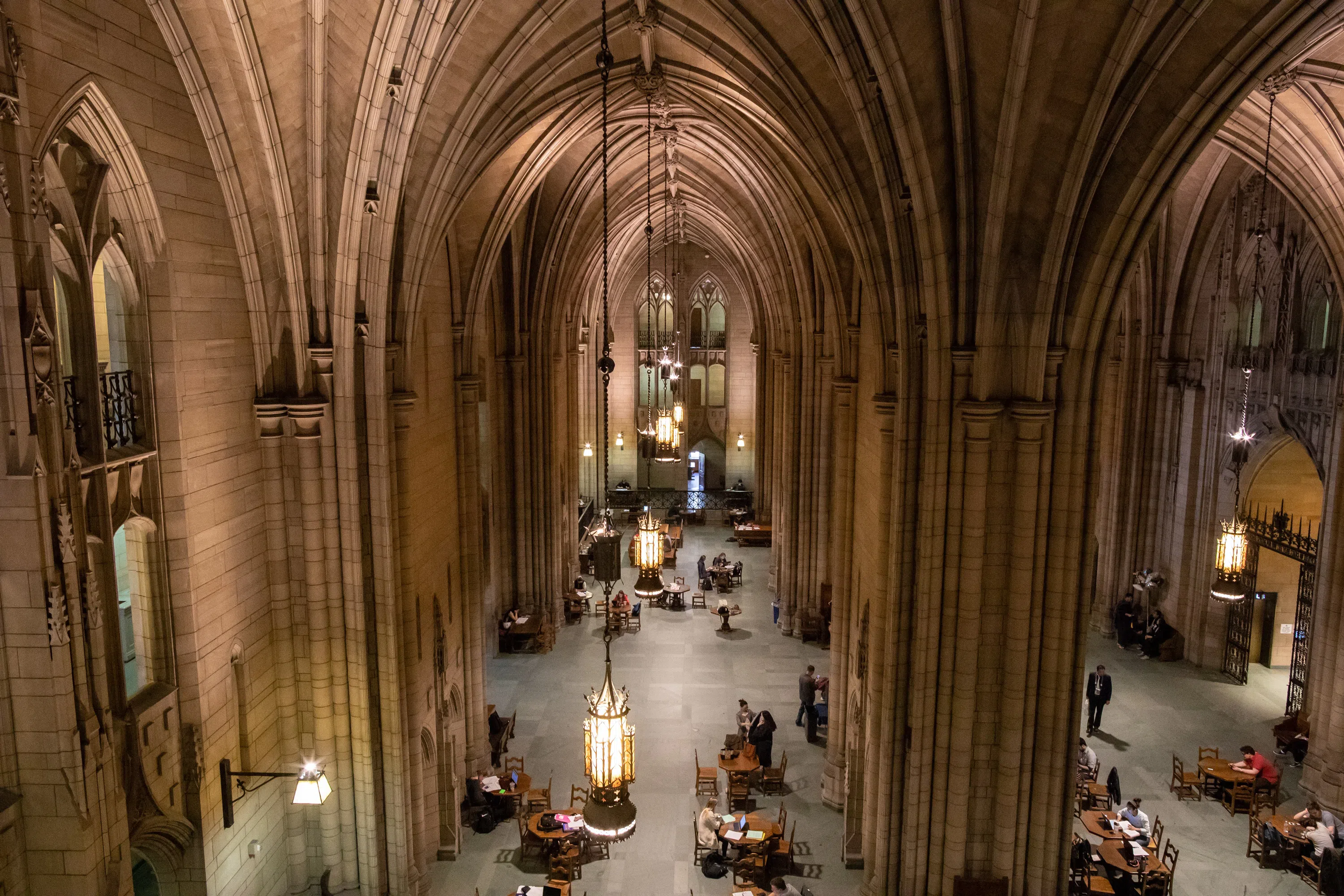 Bird's eye view of students studying in the Cathedral Commons Room