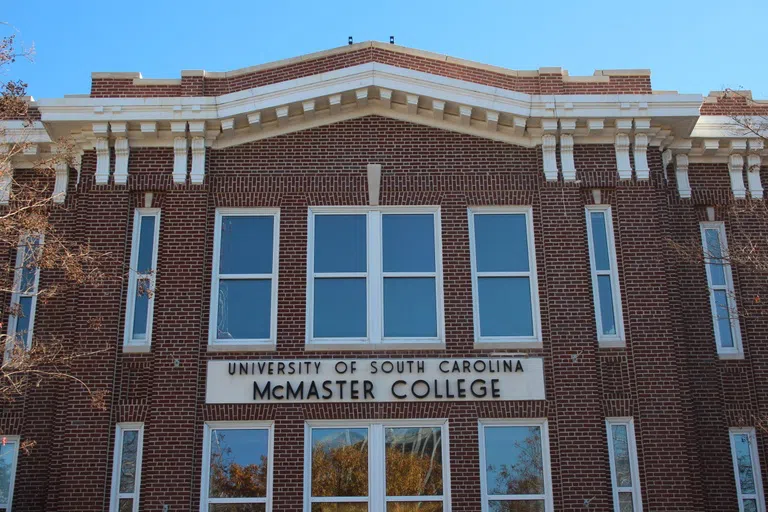 View of the Pickens Street entrance of McMaster College during the day