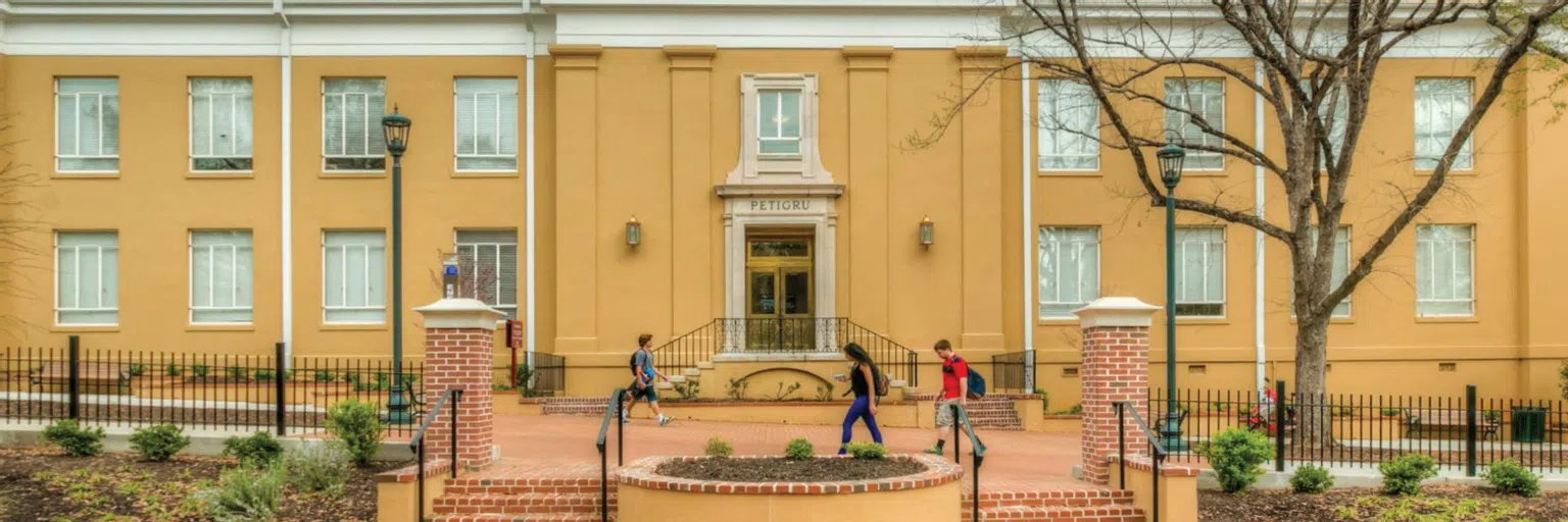 Students walking in front of Petigru College.