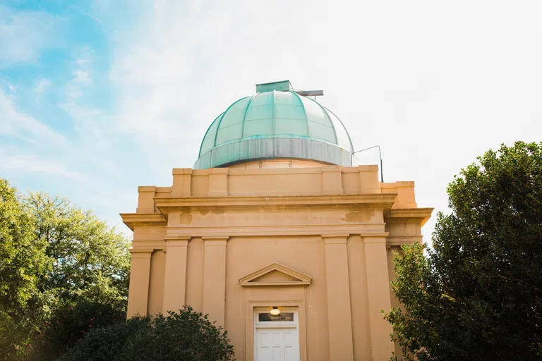 View of the front of the Melton Observatory during the day