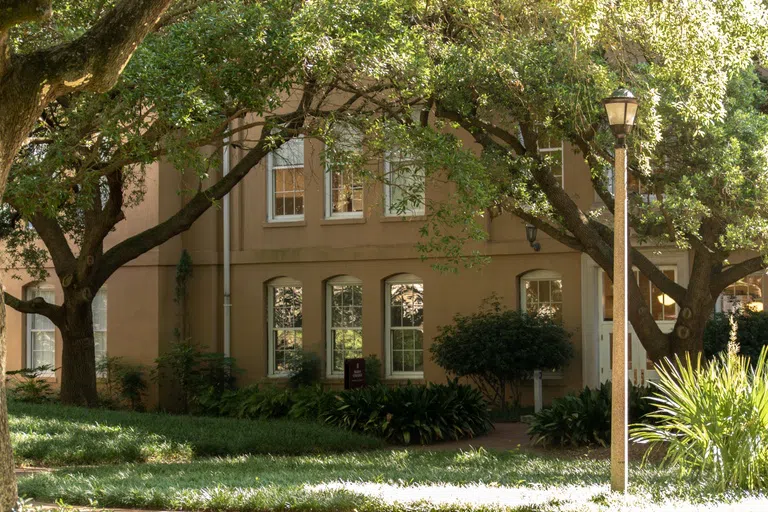 View of the front of Sloan College during the day