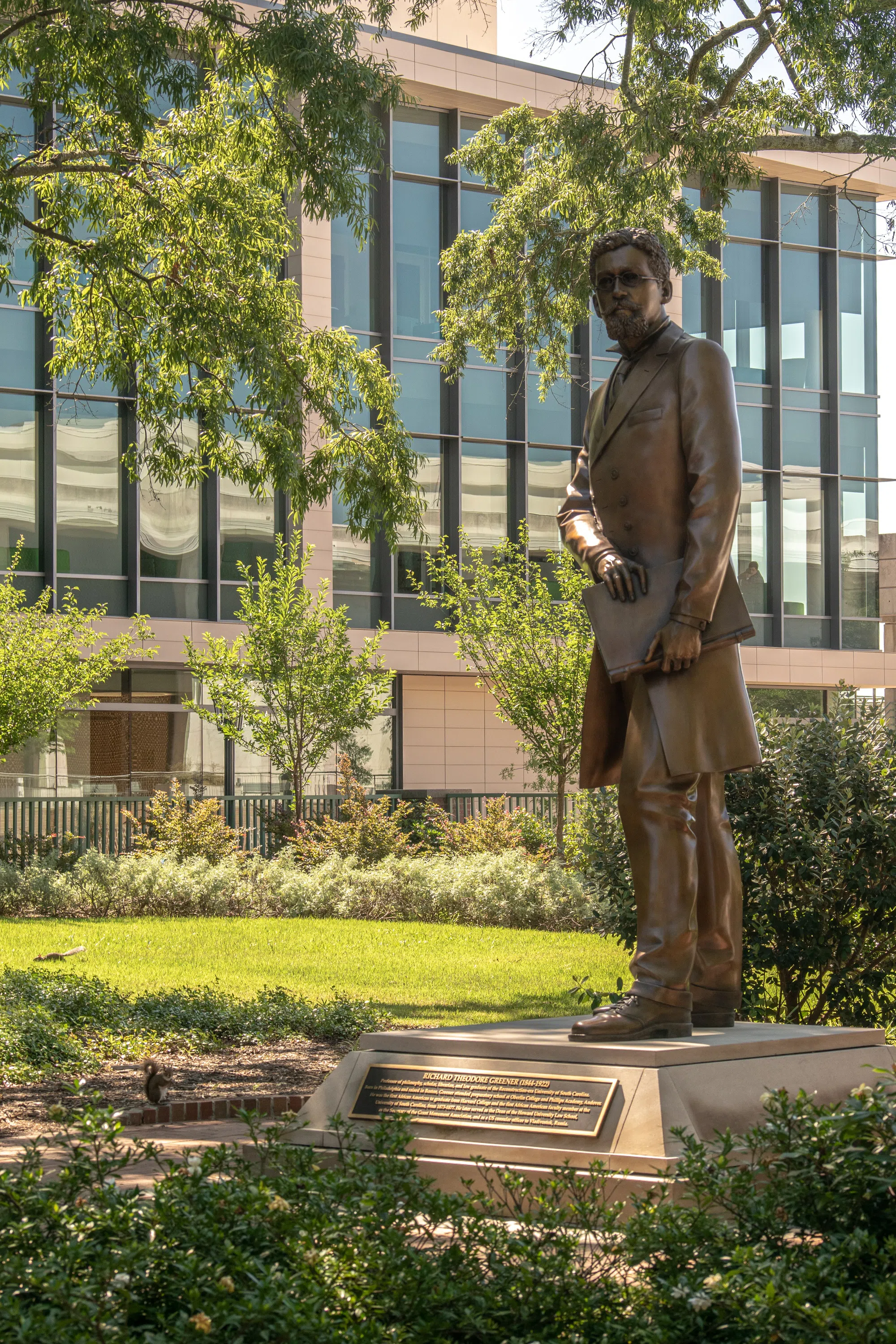 The Richard T. Greener statue stands tall in front of the Center for Health and Well-Being.