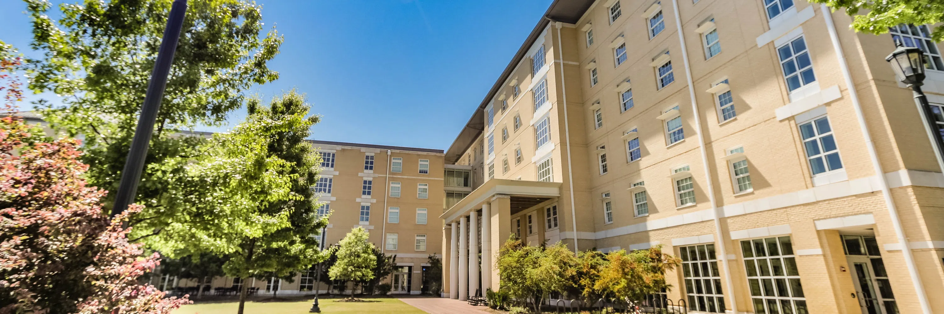 View of the front of the Honors Residence Hall during the day