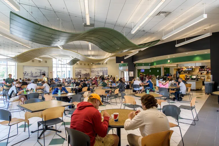 Students eating at the Hanger, one of two large dining halls on campus.