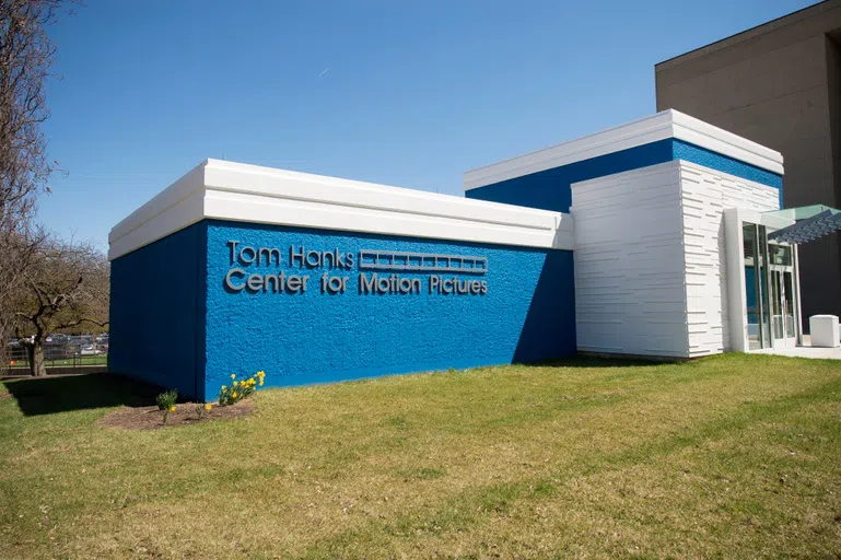 A building with the words Tom Hanks Center for Motions Pictures.