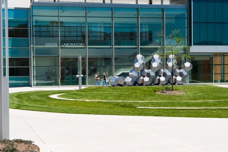 Students walk in front of Diggs Laboratory.