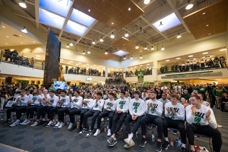 Wright State men's basketball team gathers with fans, friends, and family in the atrium to learn their fate for the NCAA March Madness tournamen.