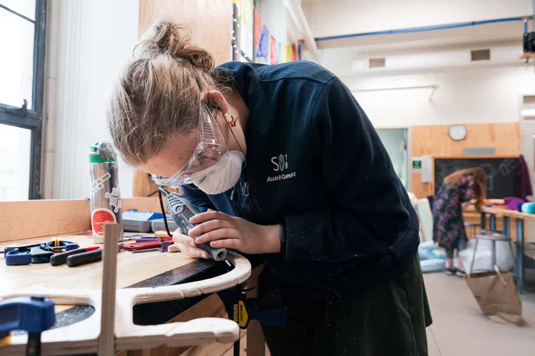 Wellesley student working on an art project 