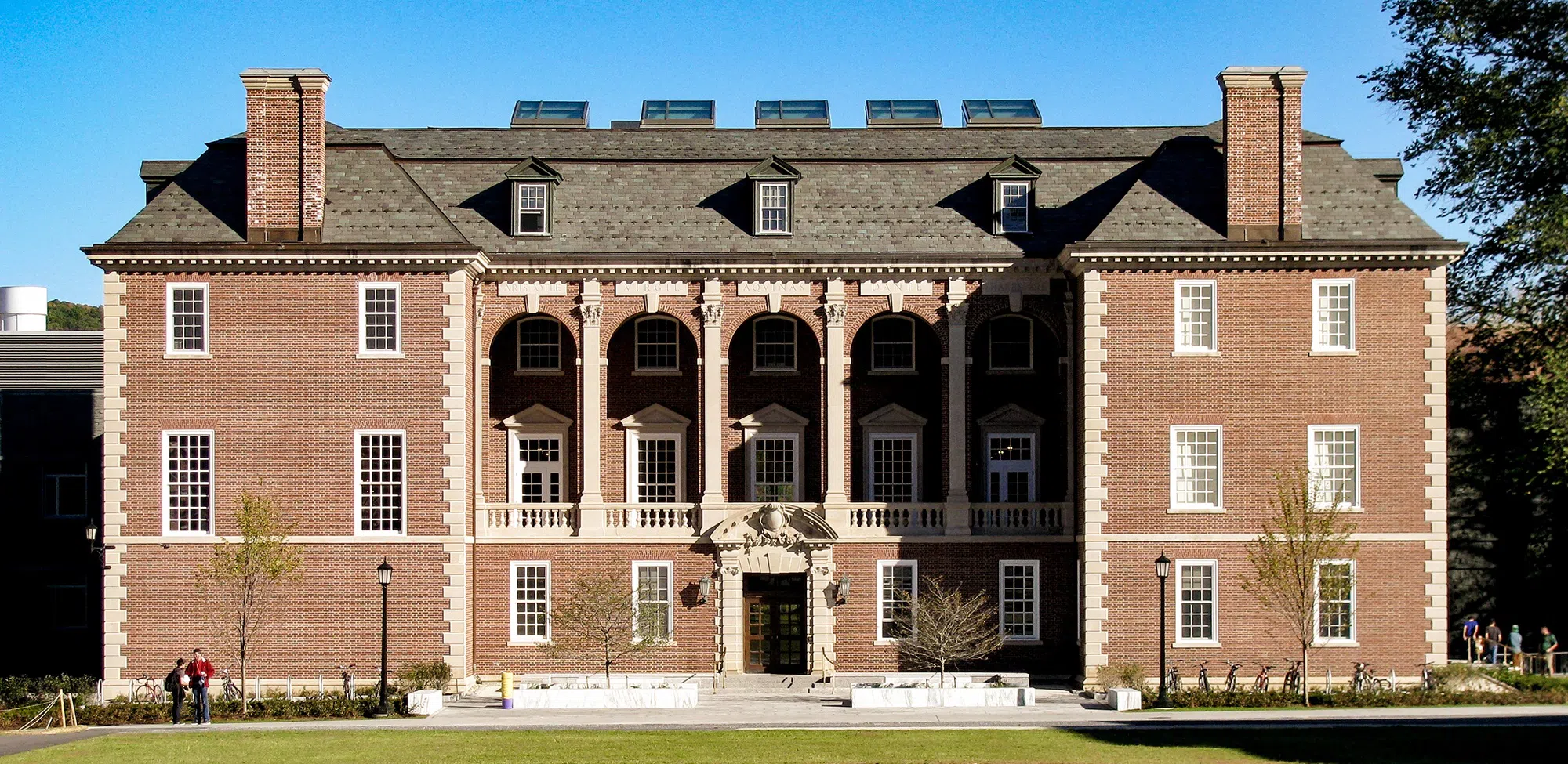 image of red brick library with arches