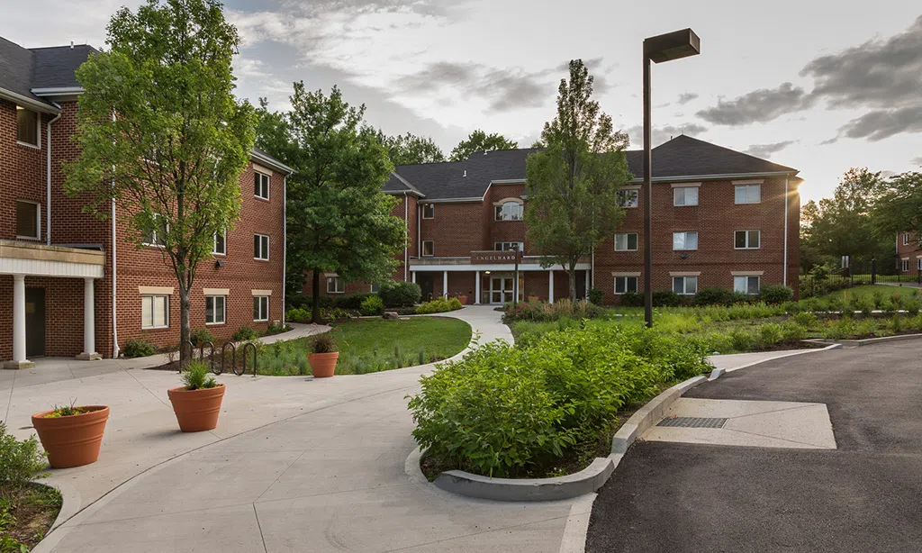This picture of centennial village depicts the outside view of Caldwell Hall from the courtyard.