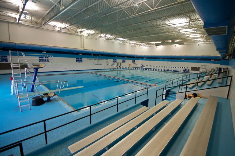 Swimming pool and bleachers inside the Gentry Complex