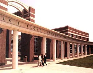 Front of Floyd-Payne Campus Center brown with white columns. 